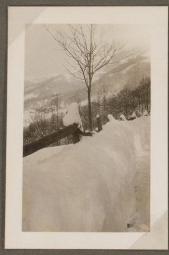 Snow-covered gate on the road between Bettagno and Odogno, Switzerland