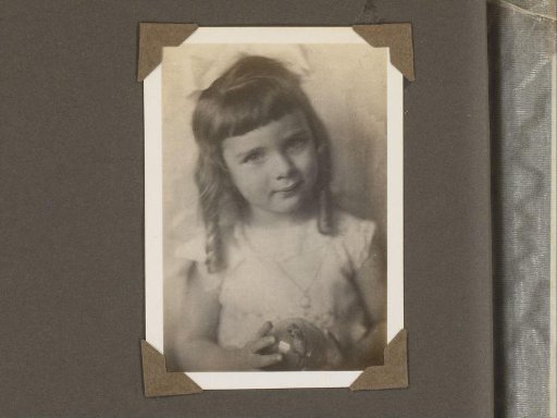 Portrait of a Girl with Ringlets and a Bow in Her Hair, Holding a Ball