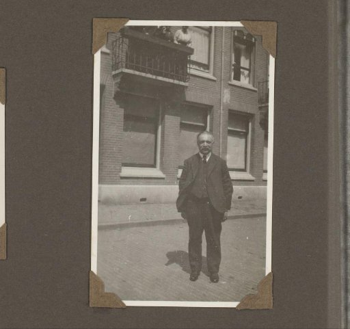 Portrait of a man standing in a street
