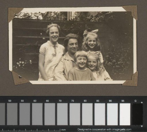 Family Portrait in a Garden with a Woman and Four Children