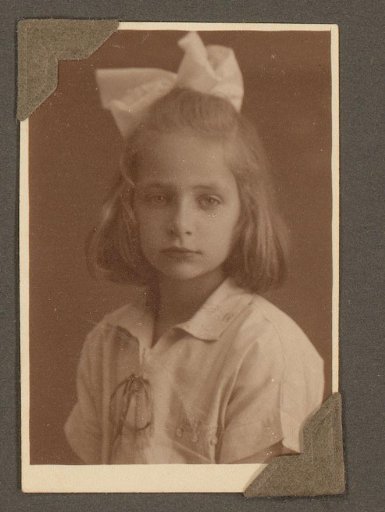 Portrait of a Girl with a Bow in Her Hair