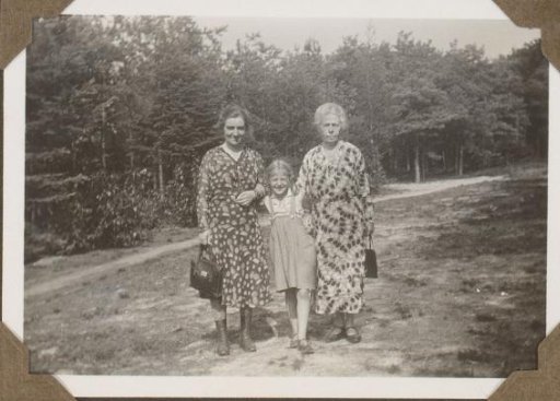 Portrait of Two Women and a Girl Between Them