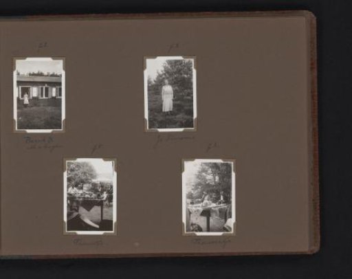 Two portraits and a tea table in the garden