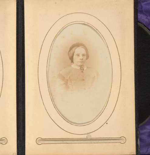 Portrait of a Woman with Glasses and a Cap