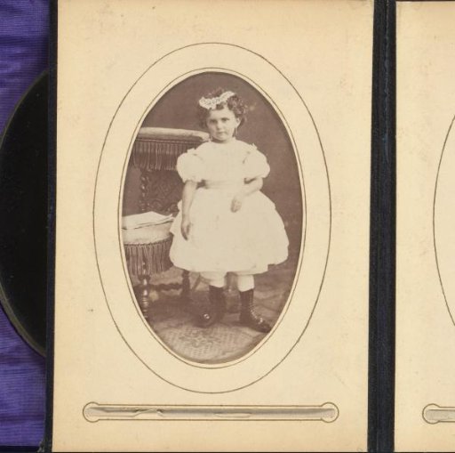 Portrait of a girl, standing by a chair