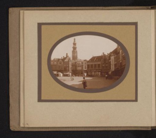 View of a Square with a Church Tower in the Background