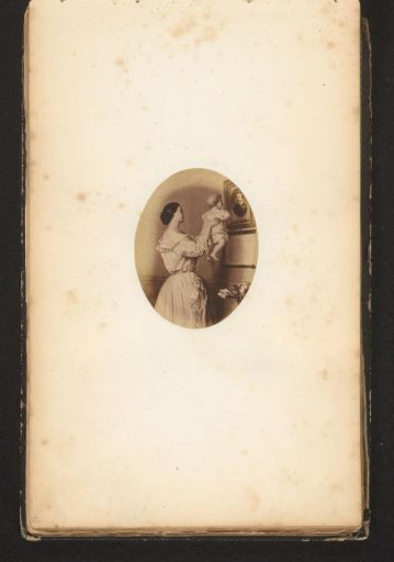 Photographic reproduction of a painting of a mother stopping her child to look at a painted portrait of a man