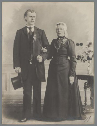 Portrait of an unknown couple in traditional dress