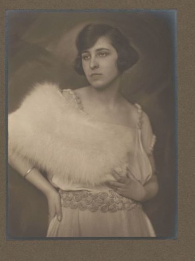 Portrait of Mies Merkelbach with white fur trim over a dress