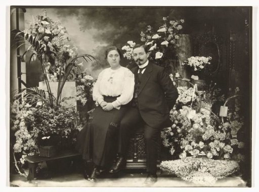 Portrait of Jacob Merkelbach and wife surrounded by flowers