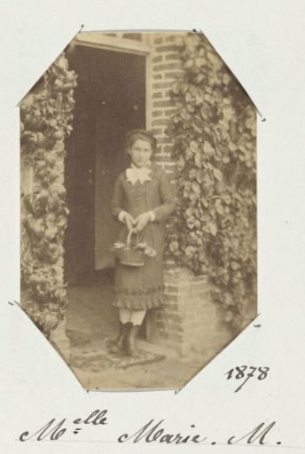 Portrait of an unknown young woman in a doorway with a basket, inscribed as Marie M.