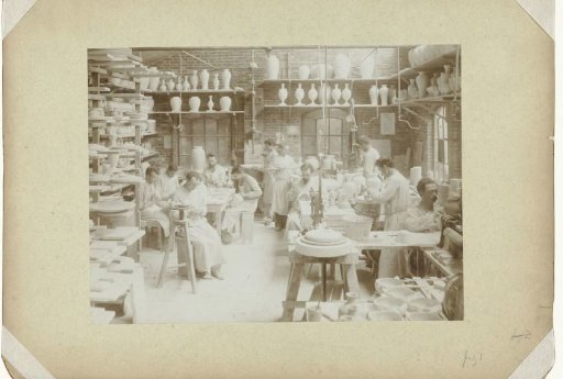 Men working in the model room of the Rozenburg porcelain factory