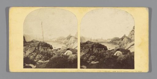 Rocks along the coast of Devon, with Ilfracombe in the background
