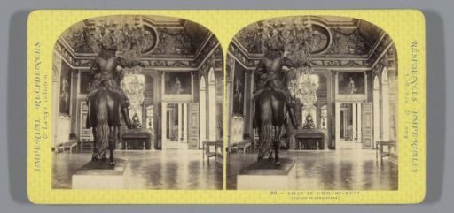 Interior of a hall with an equestrian statue in the Palace of Versailles