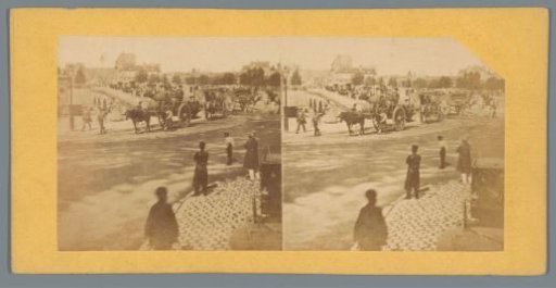 Street scene of Paris with people and horse-drawn carriages on a bridge