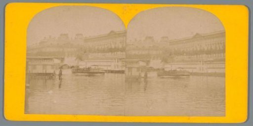View of the Seine in Paris with the town hall in the distance