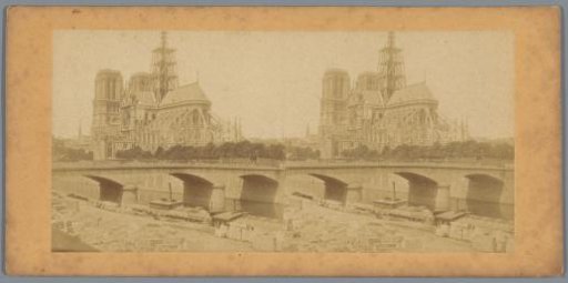 View of Notre-Dame with scaffolding and the Pont de l'Archevêché in Paris