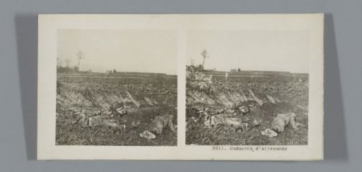 Fallen German soldiers in a meadow