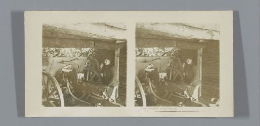 French soldiers next to a howitzer