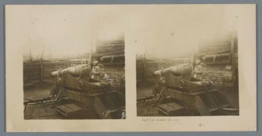 Soldier beside a howitzer