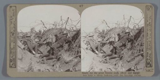 Ready for the great Somme push, officer and signallers keep a sharp look-out over the Sausage valley