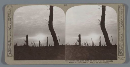 The Golden sun goes down in peace o'er the desolate waste of "No man's Land." on the Somme