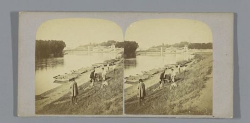 Riverbank with moored rowing boats (presumably) in France