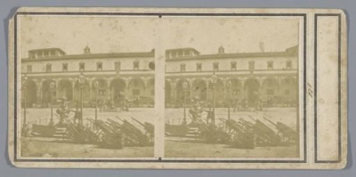 Facade of the Foundling Hospital in Florence, with wheelbarrows in the foreground