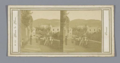 View of a road in Sorrento, with a group of people in the foreground