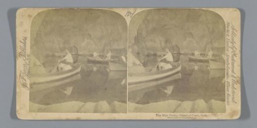 Rowing boats in the Blue Grotto in Capri