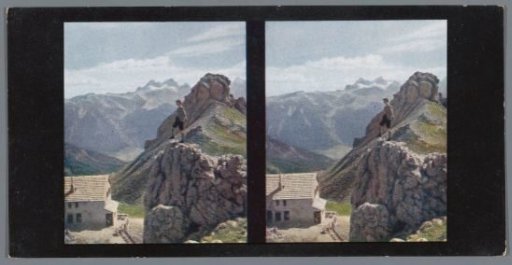 Rock wall hut in the Dolomites, with a boy on a mountain in the foreground