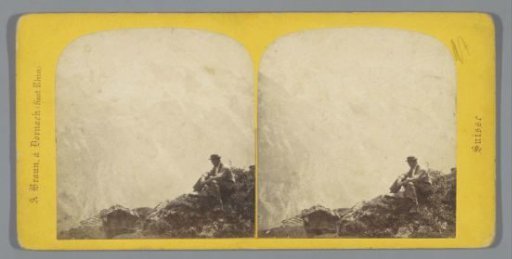 Man seated on a mountain cliff near Mürren