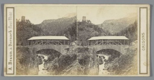 Bridge over the Gelgia in Oberhalbstein, Switzerland. In the distance the ruin of Burg Spliatsch