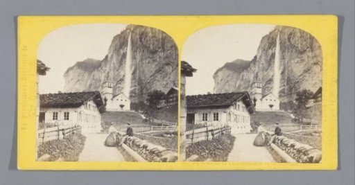 View of a church in Lauterbrunnen, with the Staubbach waterfall in the background