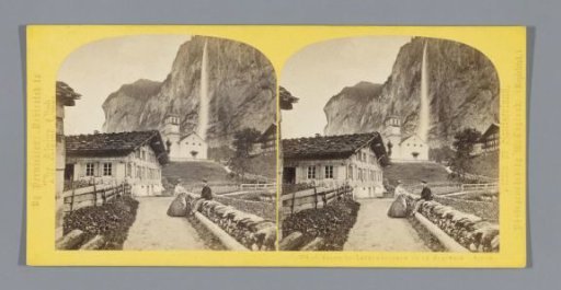 View of a church in Lauterbrunnen, with the Staubbach Falls in the background