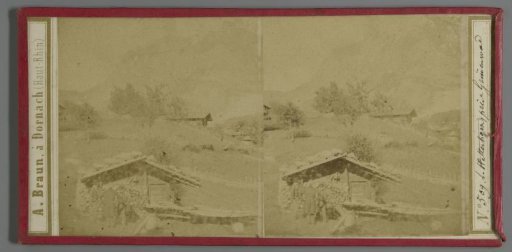 Three men in front of a wooden hut with the Wetterhorn in the background, Switzerland