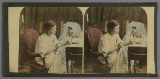 Seated half-naked woman with glass in hand