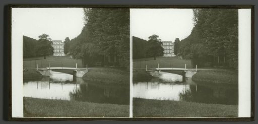 View of a classicist villa and landscape garden