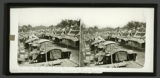 Canal with houseboats in Puthia, Bangladesh