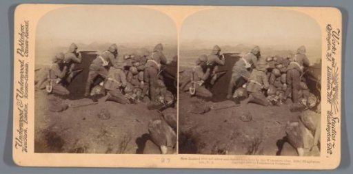 Five soldiers behind a stone defensive wall at Slingersfontein, 25 January