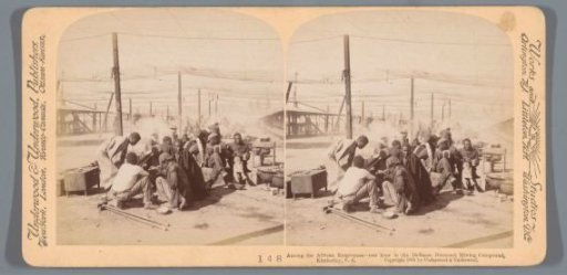 Resting African miners at a De Beers diamond mine in Kimberley, South Africa
