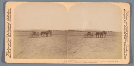 View of a man with a horse-drawn wagon at the spot at Colenso where Colonel Charles James Long was mortally wounded