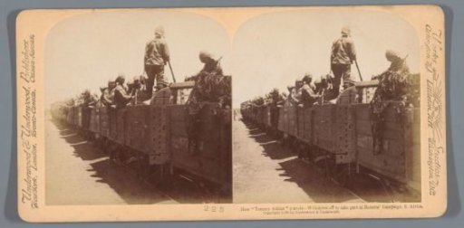 British soldiers in an open railway wagon in South Africa