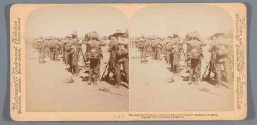 Staged scene of Australian soldiers resting after a march in South Africa