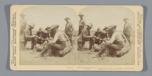 Volunteers peeling onions, near Orange River, South Africa