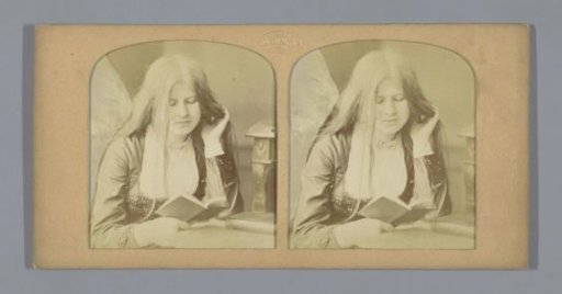 Young woman reading a book