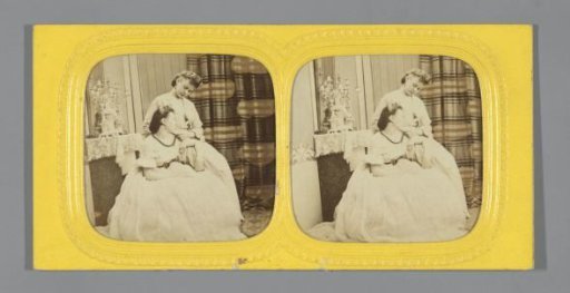 Two young women in a boudoir