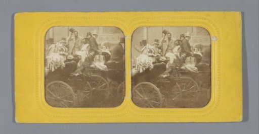 People in carriages on the street