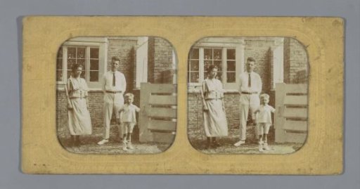 Married couple with a child in front of a house