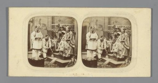 Couple in Chinese costume with servants